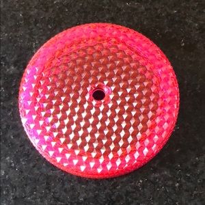 Spiky pink Starbucks cup lid